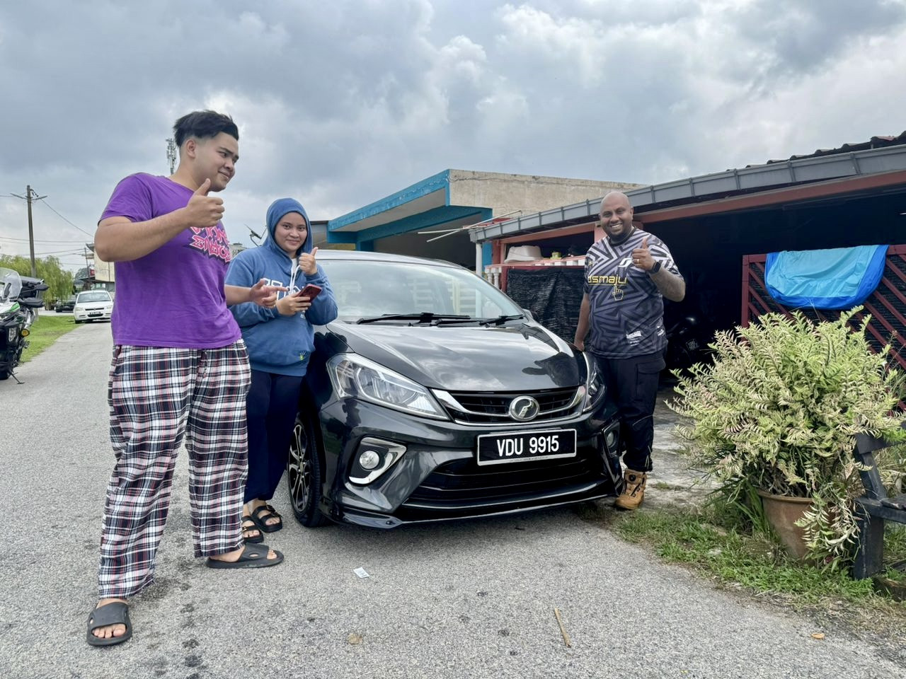 Perodua Myvi : Tq delivery the first car , thank you very much mr paul